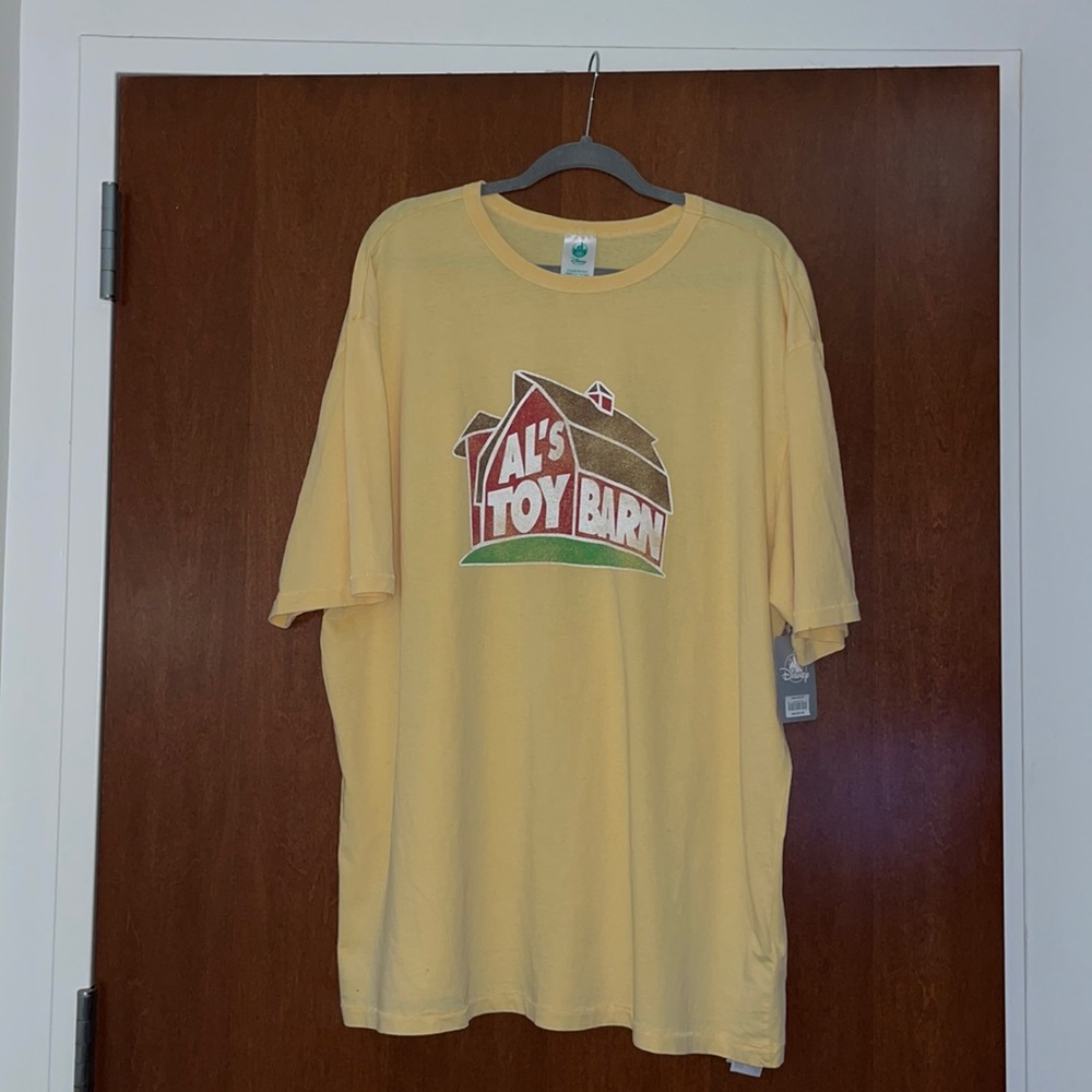 Yellow Disney “Al’s Toy Barn” T-Shirt